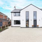 This striking house on Rose Avenue, Calow, is on the market for £575,000