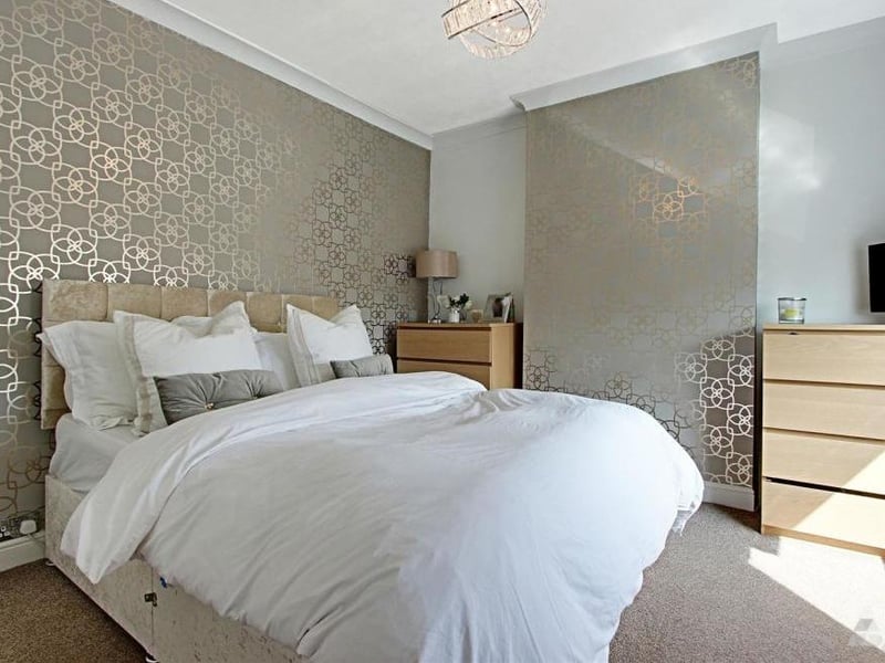 The master bedroom on the first floor of the Bath Street property. A double bed and plenty of space.
