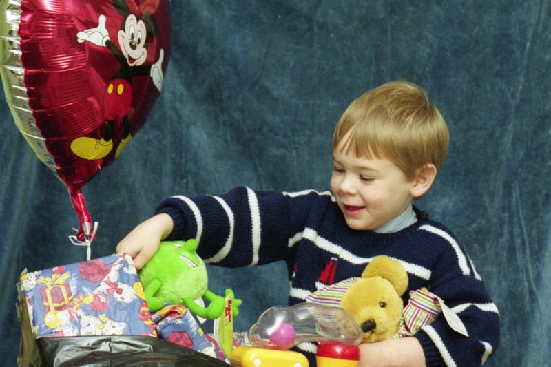 The Sunderland Echo toy appeal was a huge success in 1991 and James Adare looked like he was having a great time as he looked through the donations.
