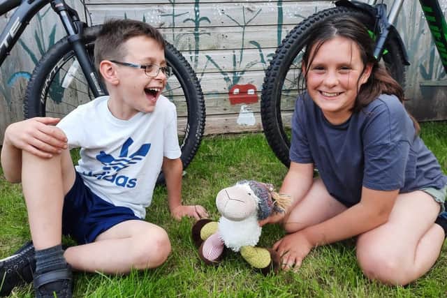 Siblings Florence and Samuel get set to brave the cycling challenge this weekend.