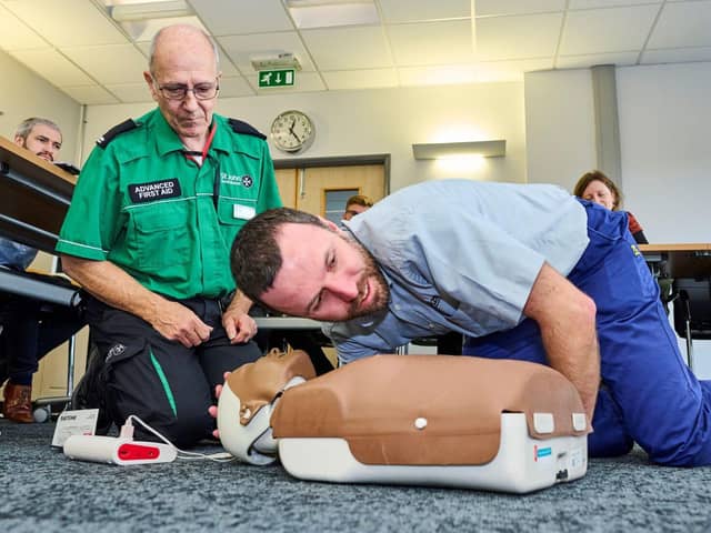 Simon Hall learns CPR from Nigel Vaughan at St John Ambulance