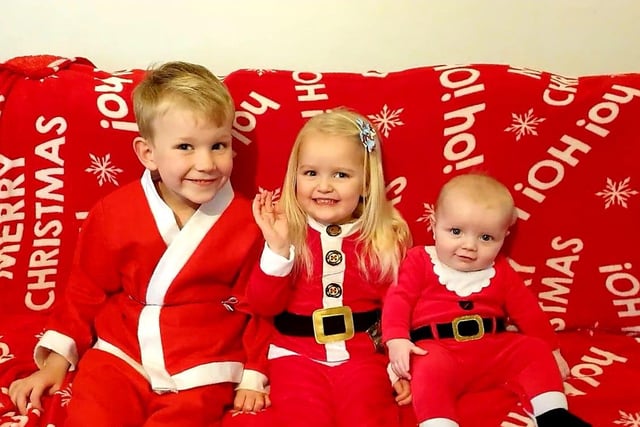Five-month-old Alexander's first Christmas with his big brother Oscar, 6, and sister, 3.