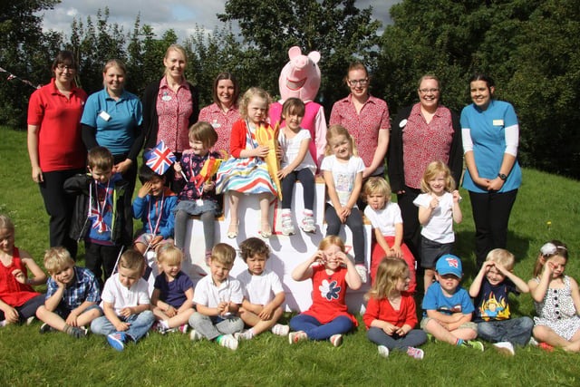 Staff and Children from Children first Clowne recieved the nursery Olympic torch from Chesterfield children in 2012