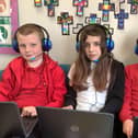 Year 6 pupils at Christ Church Primary making use of the new IT equipment which has been donated to the school by Asda