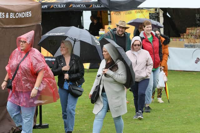 Food fans pictured making the most of a drier spell on Saturday