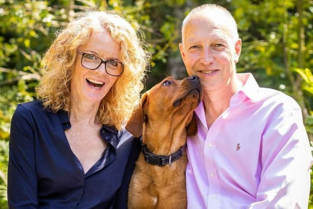 Dr Louise pictured with her partner Rob and their dog Monty