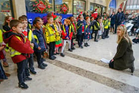 Year 2 pupils from Spire Nursery and Infant School performed outside Tesco Metro in the town’s The Pavements Shopping Centre last week, as a part of the annual tradition.