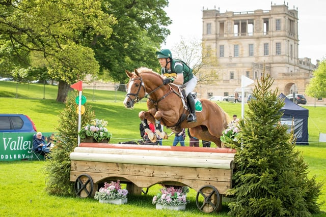 Section A winners Ireland's Austin O'Connor and the stallion Silver Don going across country in front of Chatsworth House.