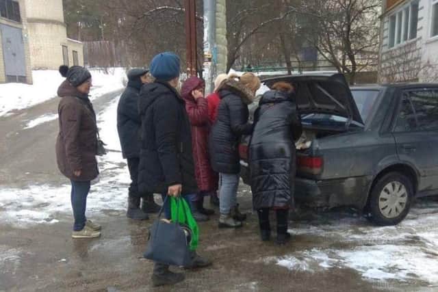 Ukrainian families waiting to receive much needed help.