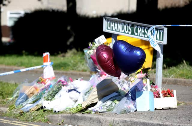 Floral tributes at the murder scene at Chandos Crescent, Killamarsh