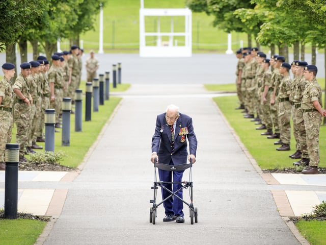 Captain Sir Tom Moore walking down a guard of honour during a visit to the Army Foundation College in Harrogate, North Yorkshire as part of his new role as Honorary Colonel of the Northern military training establishment.
