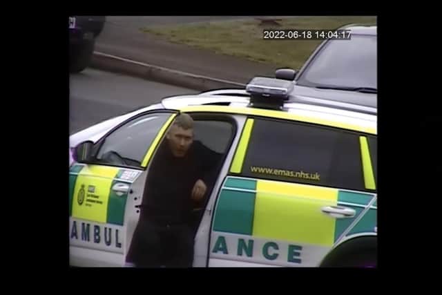 Harrison was captured on CCTV speaking to paramedics - four hours after beating his son.