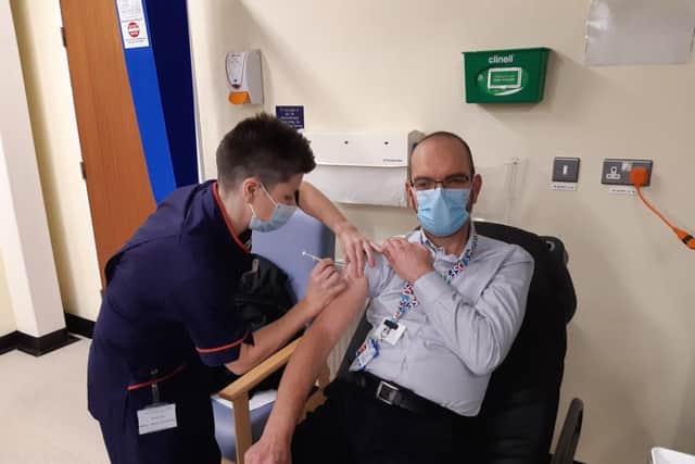 Back in December last year, Matron Gemma Cort gave the first vaccination to Ian Hazel, director of IT and Infrastructure at DSFS.