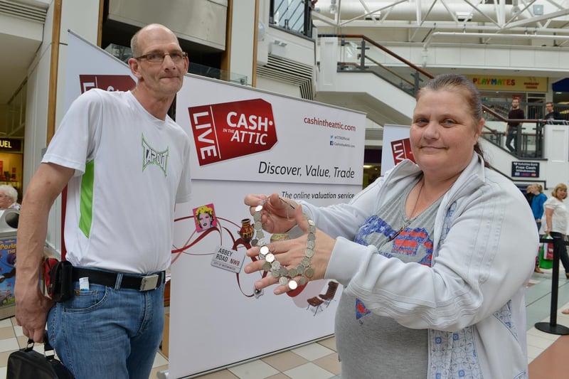 Popular TV antiques programme Cash in the Attic paid a visit to the Middleton Grange shopping centre. Burn Valley couple Karl and Jane Grigg with a necklace made from silver sixpences they took along.