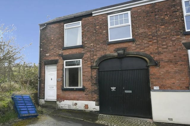 With two bedrooms and a reasonably spacious (if bare) garden, this end terraced property is valued at £90,000.