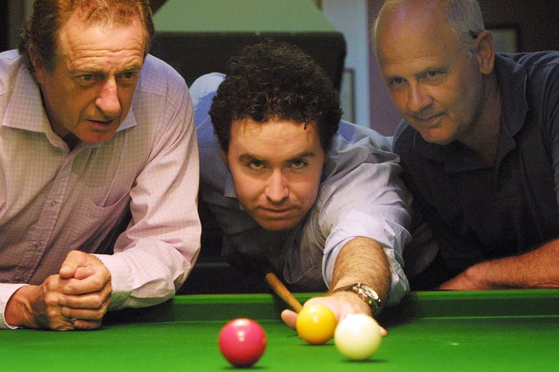 Eyes on the Ball - Former Matlock Mercury Sports Editor Rob James receives some expert tuition in the game of billiards from twice English Grand Masters champion Jim McCann and Robert Lowe of the Darley Dale and District Orme Billiard League.