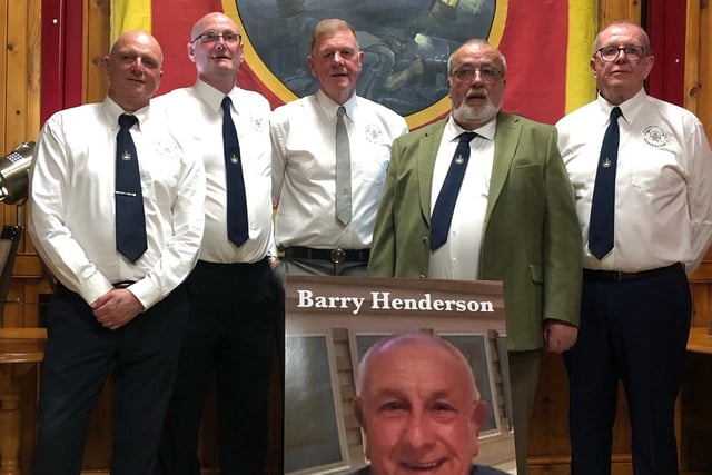 A committee of ex-miners formed for the planning of the statue. Here members pose for a photo with the restored Derbyshire Area NUM banner, alongside a photo of the late Barry Henderson, who brought forth the idea of a commemorative statue to honour the area's fallen miners.