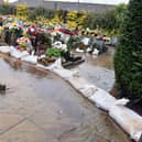 Amber Valley Borough Council says it is 'sorry for any distress caused by standing water in the cemetery'. Pictures by Brian Eyre.