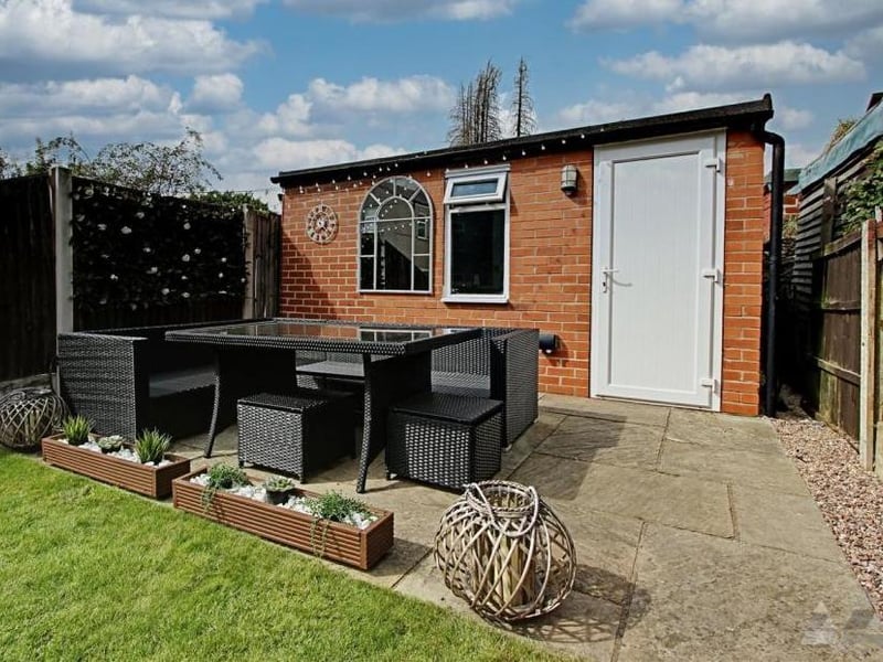 A real bonus is this patio area and outbuilding, which us currently being used as a bar. The building boasts its own heating and electricity.