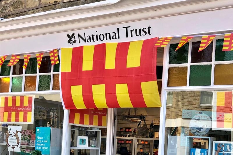 The Northumberland flag above the National Trust shop in Seahouses.
