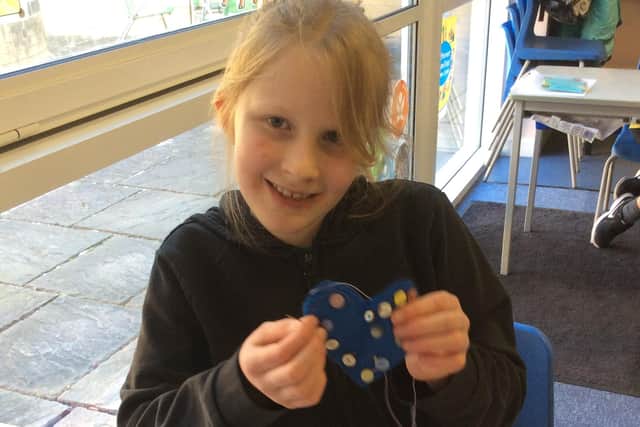 Children at the school were encouraged to create hand-sewn hearts with matching fabric that are then given to a patient and their family member.