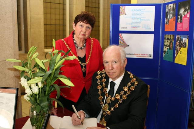 Mayor & Mayoress Cllr.Peter & Jean Barr signing Holocaust book at the Town Hall