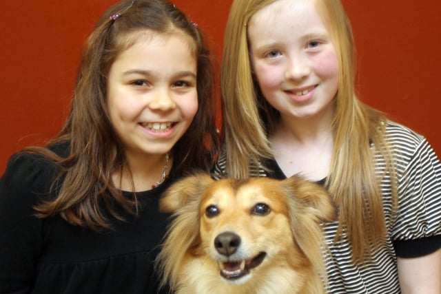 Jessica Sharatt, left, and Charlotte Noakes with Sandy after Chesterfield Operatic Society put out a call for a dog to appear in their show in 2007.