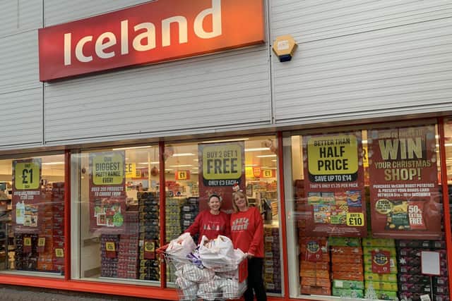 Whittington Moor Iceland Staff donate a trolley full of food to Chesterfield Foodbank