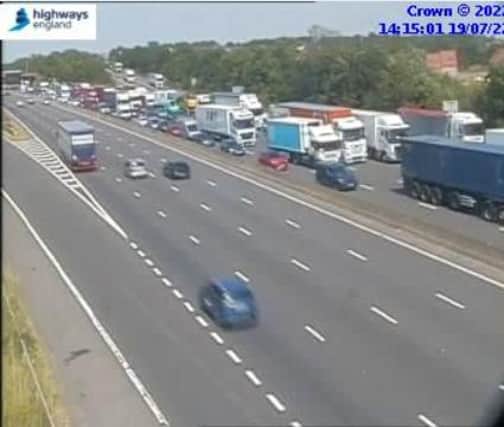 Two lanes are closed and traffic is queueing on the M1 in Derbyshire due to a broken down vehicle (picture: National Highways)
