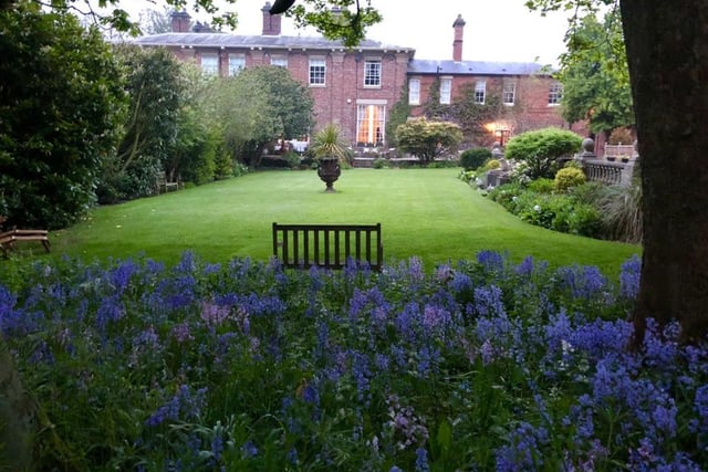 Stunning gardens are found surrounding the home, with a total of 1 acre land in total.