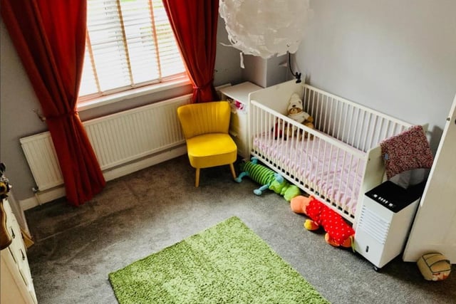 The house has four bedrooms including this one which is used as a nursery.