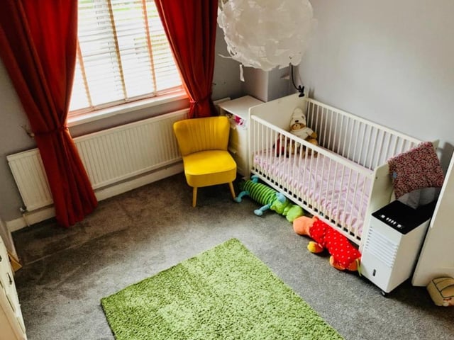The house has four bedrooms including this one which is used as a nursery.
