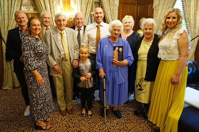 Mary with family and friends at her 100th birthday party.
