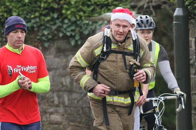 The firefighter's kit is design to keep the heat out, but also keeps it in so Paul's body temperature reached uncomfortable levels while running.