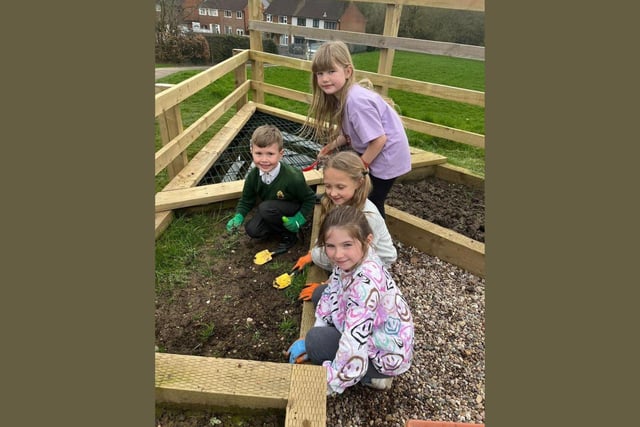 The hard landscaping has been completed but the school needs to fill the beds and is appealing to anyone who can donate flowers and plants to contact them.