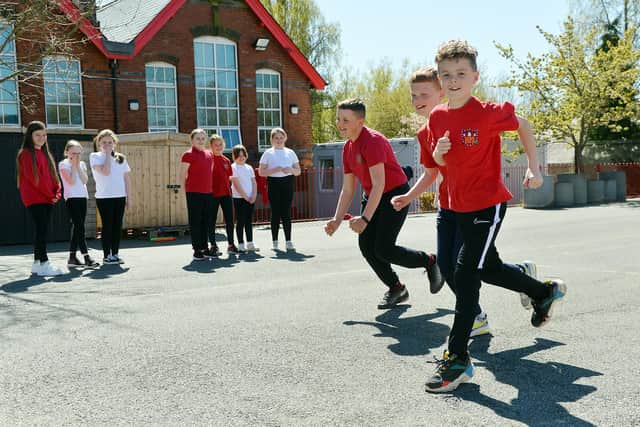 Pupils in Years 5 and 6 taking part in a PE lesson at Heath Primary