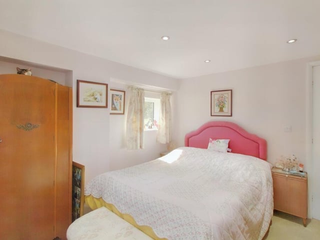Enough room for a double bed and storage cupboards.