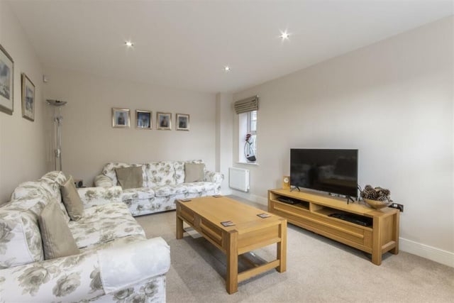Relax and watch your favourite TV programmes  in the comfort of this lovely living room.