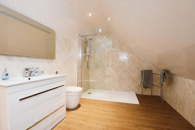 A walk-in shower cubicle with electric shower, wash basin and wc are contained within this room on the upper floor of the barn.