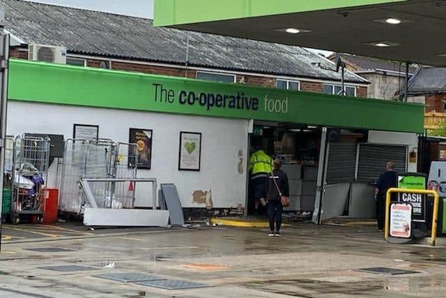 Pictures from the aftermath of the burgarly at the Co-op in Duckmanton show damage to the front of the store