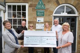 From left, YHA chair Margaret Hart, left, chief executive James Blake, Boggle Hole hostel staff and Sarah Pink.