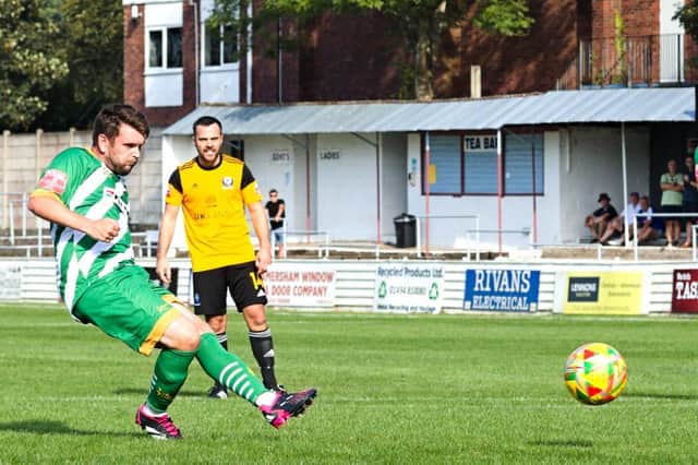 Dave Pearce slots home a penalty against Bedford. Photo: Mike Snell.