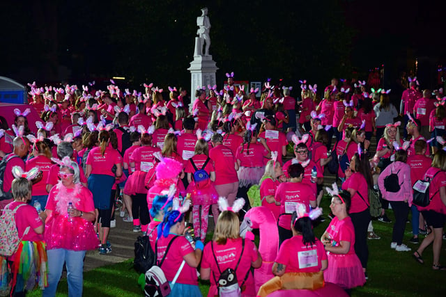 Colourful walkers stood out against the night sky  at the halfway stage in Eastwood Park, Hasland.