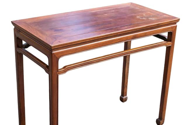The Chinese Ming Dynasty Banzhuo side table could achieve £100,000 at auction - around half the value of the Derbyshire house where it was found.  Photo:SWNS