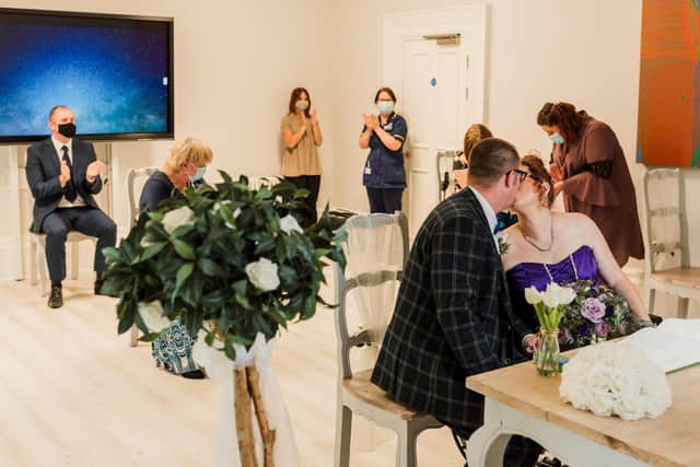 The wedding ceremony was held in the boardroom at Ashgate Hospice. Photo: Tom Hodgson.