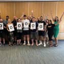 Members of Derby's Ultra Events team celebrating hitting their monumental £30m fundraising milestone