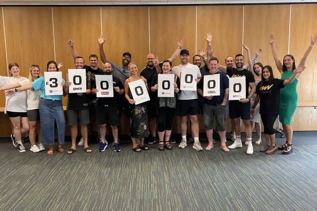 Members of Derby's Ultra Events team celebrating hitting their monumental £30m fundraising milestone