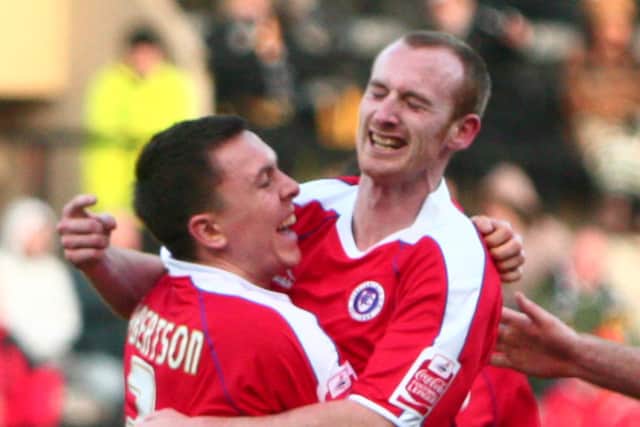 Drew Talbot celebrates after scoring his first for the Spireites in 2009.