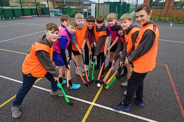 Pupils at David Nieper Academy can choose from over fifty clubs, including archaeology club, samba band and sports clubs. Pictured are year 7 pupils playing hockey.