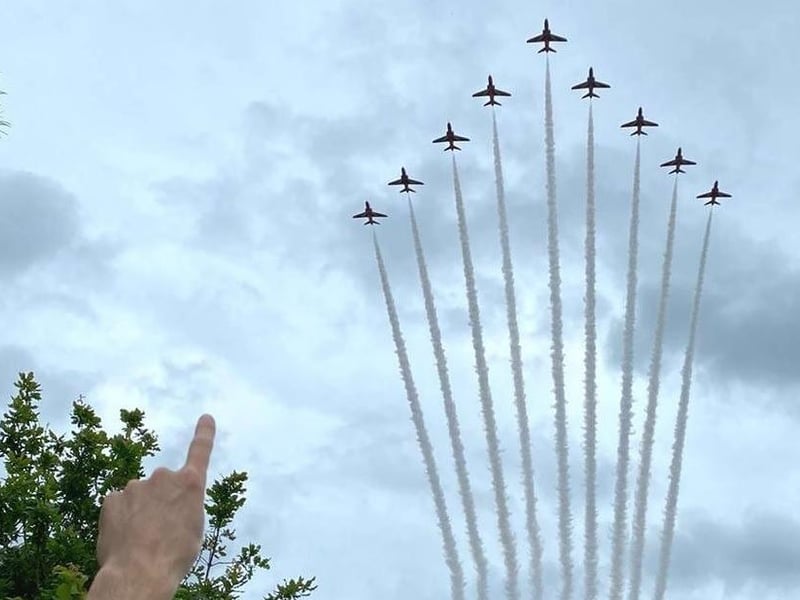 Red Arrows perform a spectacular display for families at the summer fair